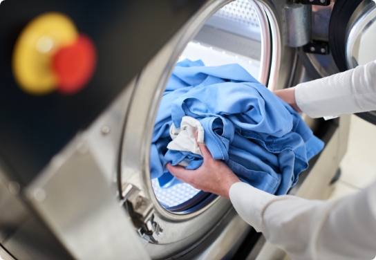 Loading a washing machine - Medstrom's decontamination services