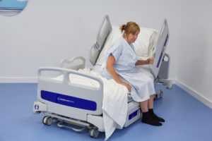 patient on low hospital bed