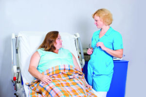 Plus-size patient and nurse