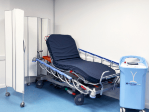 Vela XL stretcher with Medstrom ECO portable patient shower